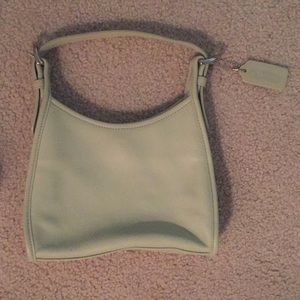 Cute never before worn mint green coach bag